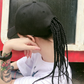 Casquette de baseball avec tresses intégrées